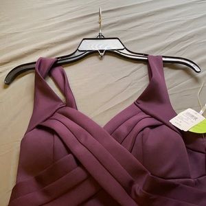 Plum-colored formal gown with long right split